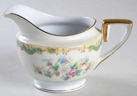 N427 Creamer