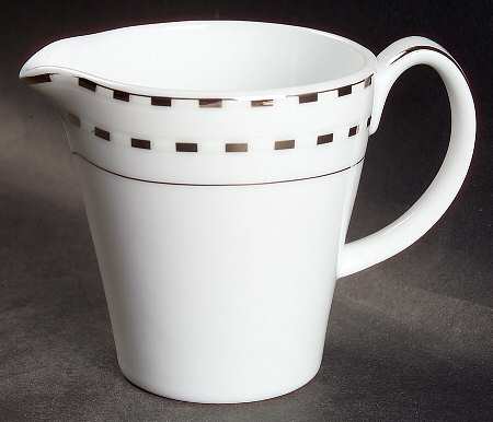 Couplet Creamer