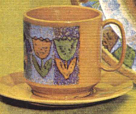 Dutch Treat Footed Cup & Saucer Set
