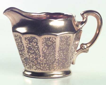 Rose and Daisy Creamer by Pickard