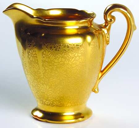 Rose and Daisy Creamer by Pickard