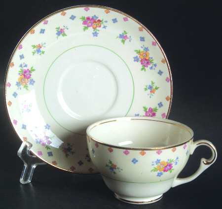1086 Footed Cup & Saucer Set