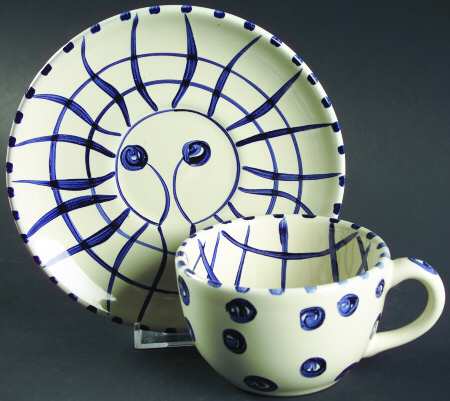 Four Sisters Flat Cup & Saucer Set