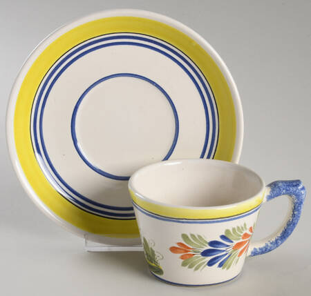Henriot (Lady Or Man Center) Flat Cup & Saucer Set