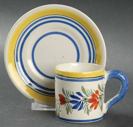 Henriot (Lady Or Man Center) Flat Demitasse Cup & Saucer Set