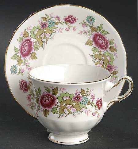 Chinese Tree Footed Cup & Saucer Set