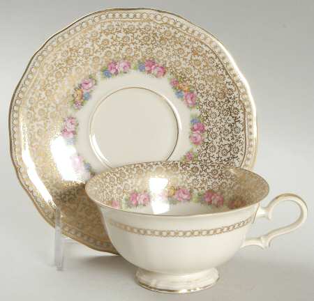 Rose Point Footed Cup & Saucer Set