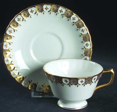 Heraldic Gold Footed Cup & Saucer Set