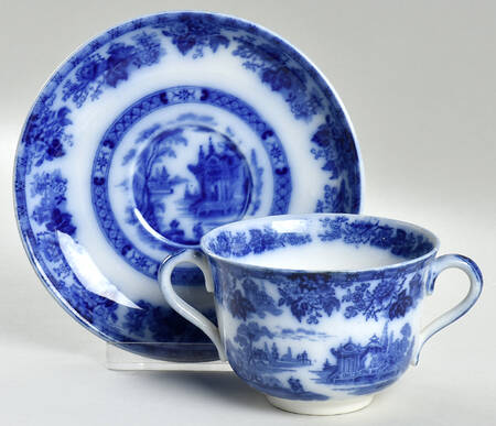 Madras (Flow Blue) Flat Bouillon Cup & Saucer