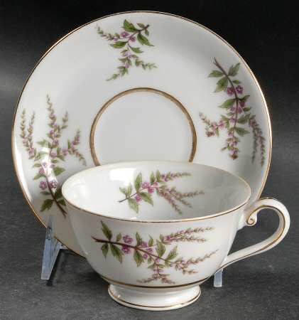Avon Footed Cup & Saucer Set