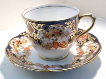 Heirloom (Crown China Stamp, SCALLOPED) Footed Cup & Saucer Set