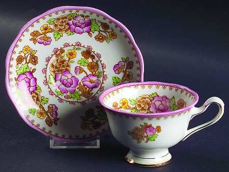 Old Cathay Footed Cup & Saucer Set