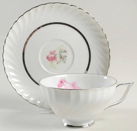 Sterling Rose Footed Cup & Saucer Set