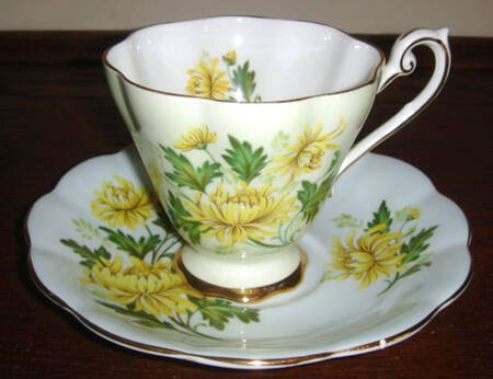 Romance Footed Cup & Saucer Set