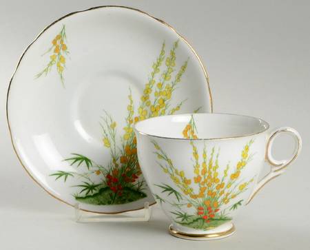 Broom Footed Cup & Saucer Set