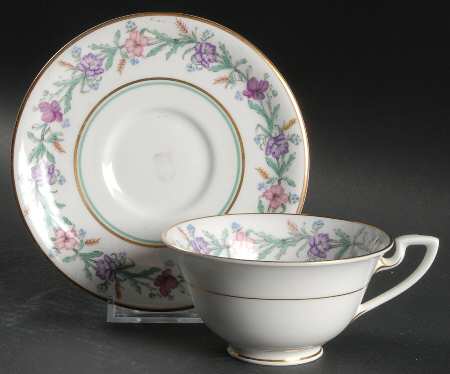 Elysian (White Body) Footed Cup & Saucer Set
