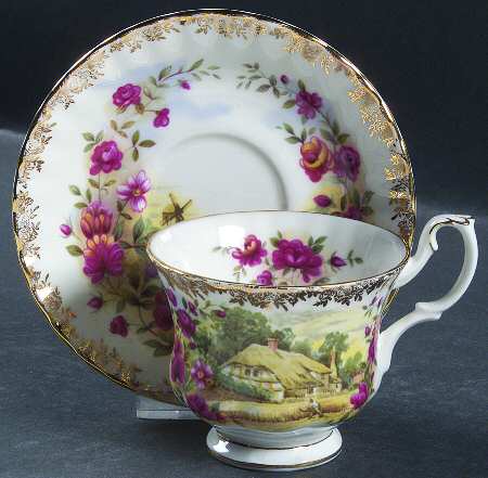 Four Seasons Footed Cup & Saucer Set