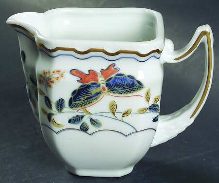 Papillons Creamer