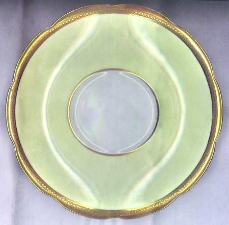 Yarborough Ivory and Gold Saucer