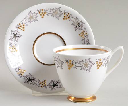 Gold and Silver Footed Cup & Saucer Set