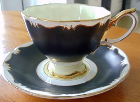 1969 Black Footed Cup & Saucer Set