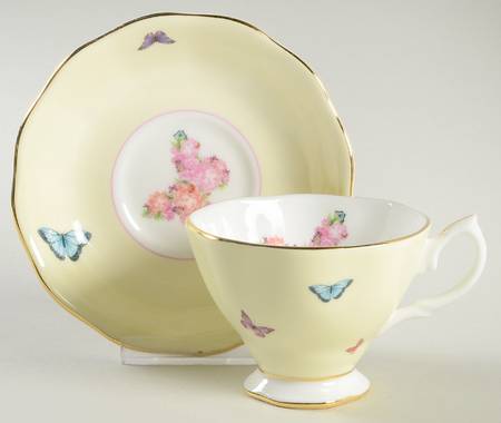 Friendship Footed Cup & Saucer Set