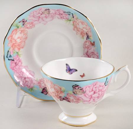 Friendship Footed Cup & Saucer Set