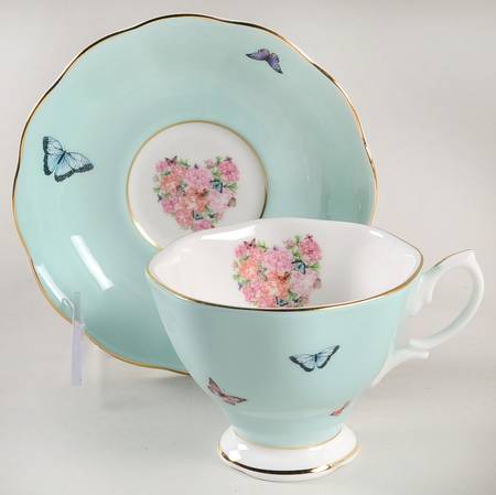 Friendship Footed Cup & Saucer Set