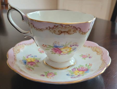 1121 Pink Footed Cup & Saucer Set