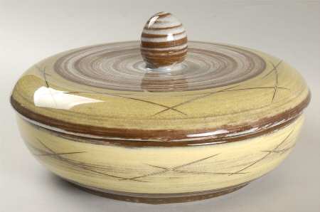Stylized Spirals Brown and Yellow Round Covered Vegetable