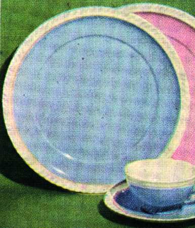 Pate Sur Pate Blue Footed Cup & Saucer Set