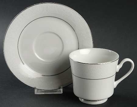 White On White Footed Cup & Saucer Set