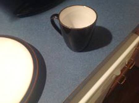 Solitude Black Mug
