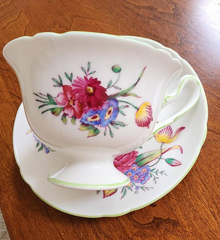 Old Bow Footed Cup & Saucer Set