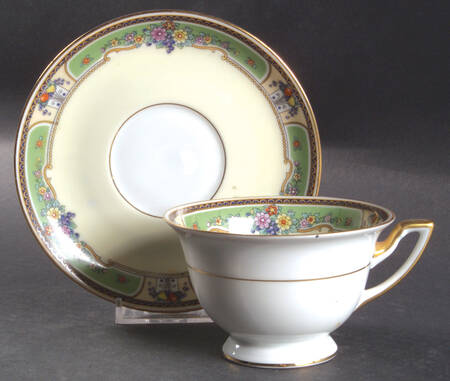 Emerald Footed Cup & Saucer Set