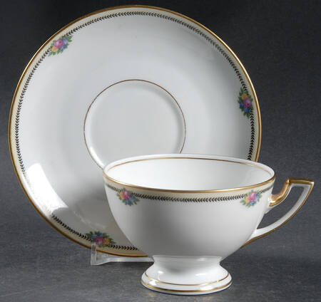 Rose Point Footed Cup & Saucer Set