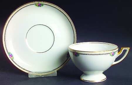 Rose Point Footed Cup & Saucer Set