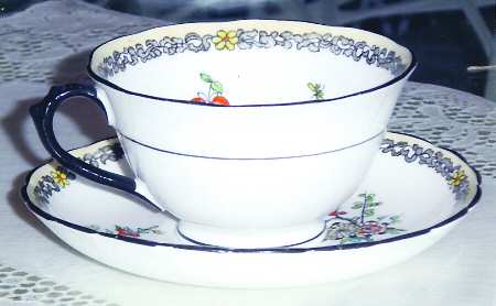 7764 Footed Cup & Saucer Set