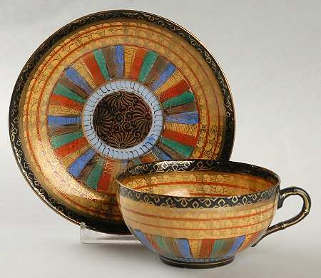 Thousand Faces Footed Cup & Saucer Set
