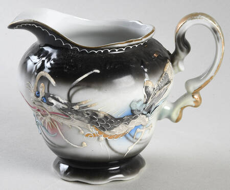 UC1036 Creamer