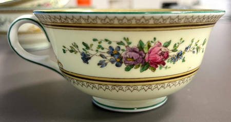 Columbia Ivory Body (Yellow Griffons) Footed Cup & Saucer Set