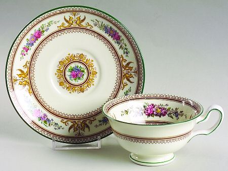 Columbia Ivory Body (Yellow Griffons) Peony Shape Footed Cup & Saucer Set