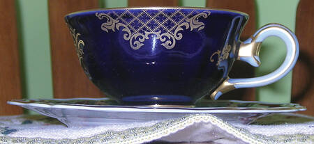 WEI78 Footed Cup & Saucer Set