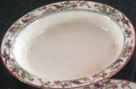 97381-2 (Rust Trim) 9" Oval Vegetable Bowl