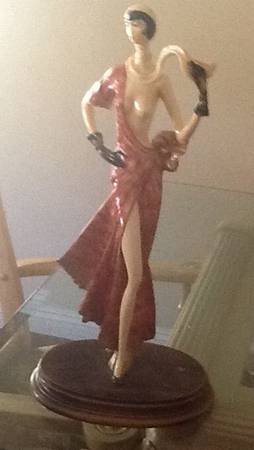 A Santini Sculptures Lady In Red Dress Holding Scarf - No Box