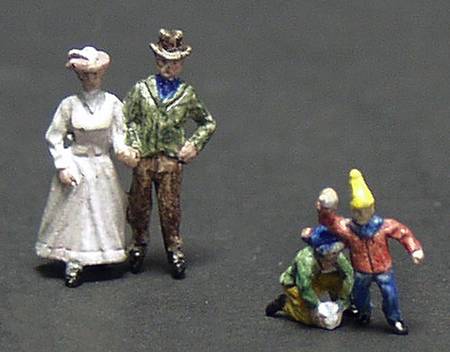 Alpine Christmas Village Skating Couple And Children - Boxed