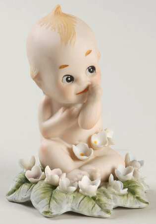 Lefton Figurines Smiling Kewpie On Leaf  - No Box