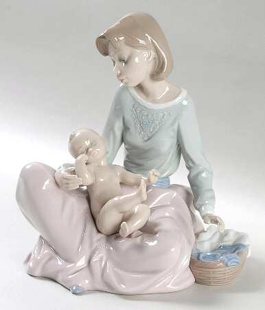 Women and Children Dressing The Baby - No Box 60