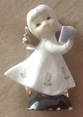 Napco Figurines and Giftware Angel Singing-Tulips On Dress - Boxed