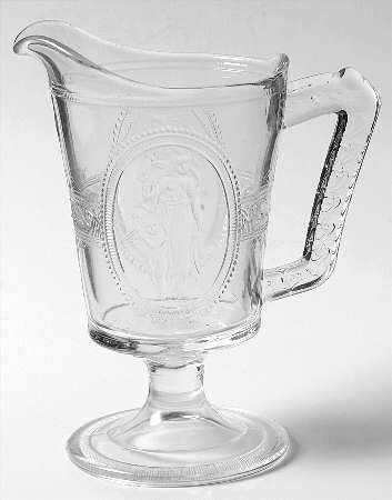 Cupid & Venus Footed Creamer